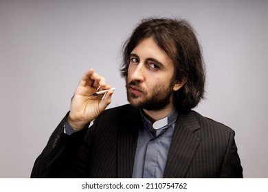 The Christian Priest Smokes Weed. 