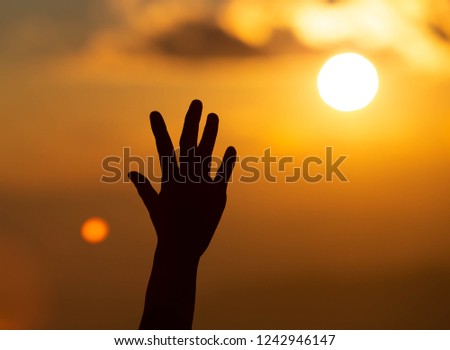 Similar – Image, Stock Photo open palm greeting sunlight. Hand in the air with soft light.