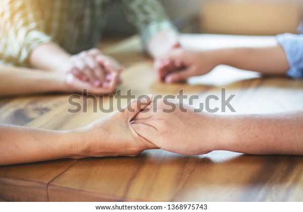 Christian Small Group Holding Hands Praying Stock Photo Edit Now