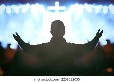 Christian worship God together in Church hall in front of music stage - Shutterstock ID 2258522035
