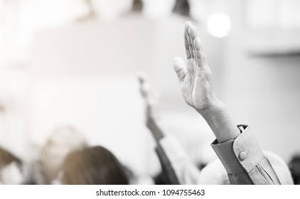 Christian Worship With Raised Hand In Church.black And White Tone.