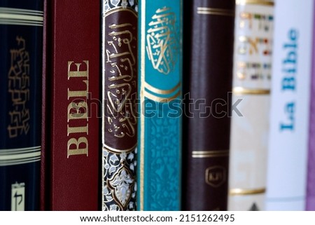 Christianity, Islam and Judaism.  Bible, Quran and Torah. Interfaith  or interreligious religious symbols.  Faith and spirituality concept. 