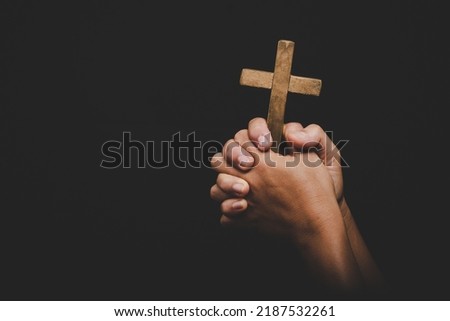 christianity woman catholic hand holding cross or crucifix pray to god, person prayer in church concept of religion, spirituality, religious, believe, , faith, hope, worship