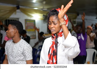 CHRISTIANS HAVING A PRAISE AND WORSHIP SESSION IN A LAGOS CHURCH, NIGERIA - NOVEMBER 18, 2016: Christians having a praise and worship session in a church, in Lagos Nigeria on November 18, 2016