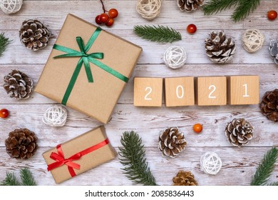 Christmas 2021; Christmas present box, toy blocks, and ornament.