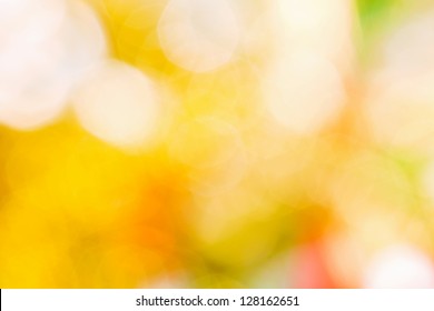 Christmas Abstract. Blurred Yellow Glare. Beautiful Bright Background