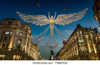 Christmas Angels Holiday  Lights On Regent Street. Festive Lights Display On Popular, Shopping London Street.