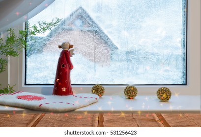 Christmas background, angel on winter window. Christmas decoration. Desk space. Xmas angel - Powered by Shutterstock