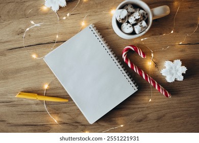 Christmas background with blank notebook, christmas decorations. Space for text. Christmas concept, preparation for xmas holidays, notepad for wish list, Santa letter. To do list with cocoa cup. - Powered by Shutterstock