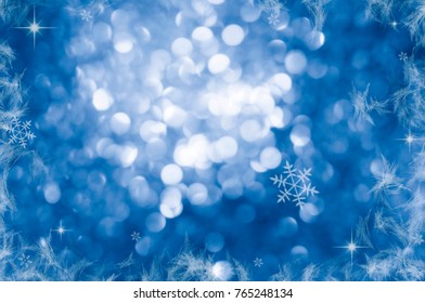 Christmas Background. Blue Holiday Abstract Glitter Defocused Background With Blinking Stars. Blurred Bokeh