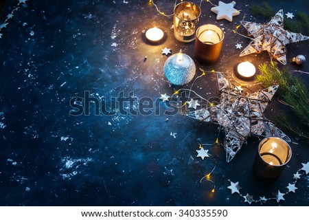 Christmas background with festive decoration, stars and candles. Christmas background with copyspace