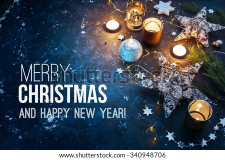 Christmas background with festive decoration  and text - Merry Christmas and Happy New Year. 