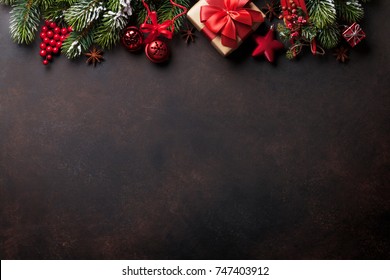 Christmas background with fir tree and decor. Top view with copy space - Shutterstock ID 747403912