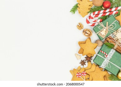 Christmas background with Christmas gingerbread cookies and gift boxes - Powered by Shutterstock