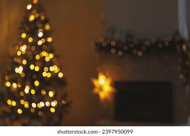 Christmas background golden bokeh. Atmospheric christmas eve at fireplace. Blurred image of illuminated christmas tree and festive decorated fireplace with lights in evening scandinavian room - Powered by Shutterstock