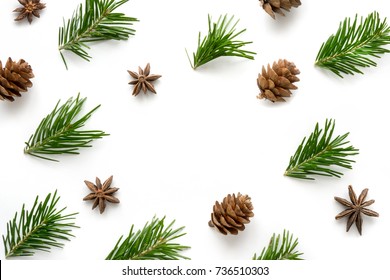 Christmas background. Pine branches, cones and star anise. Copy space in center.  