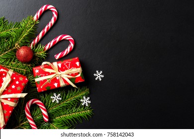 Christmas background with tree, presents and decorations. Close up