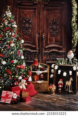 Christmas background with Christmas tree and vintage style decors with old wooden doors