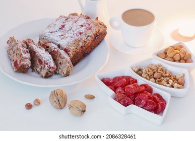 Christmas Baked Goods With Cup Of Coffee On White Table