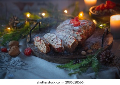 Christmas Baked Goods With Nuts, Candles, Fir Branchs