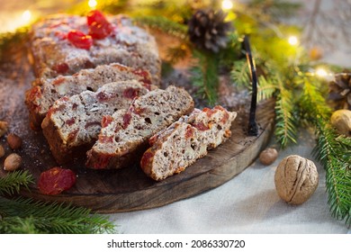 Christmas Baked Goods With Nuts, Candles, Fir Branchs