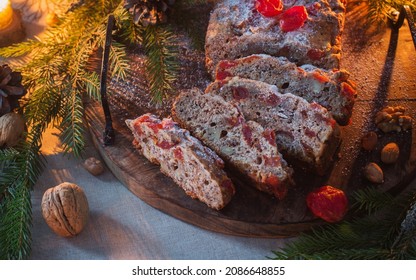 Christmas Baked Goods With Nuts, Candles, Fir Branchs