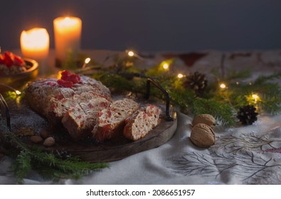 Christmas Baked Goods With Nuts, Candles, Fir Branchs