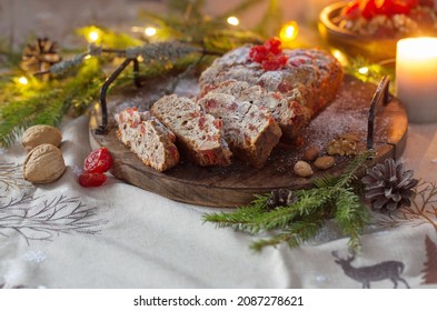 Christmas Baked Goods With Nuts, Candles, Fir Branchs