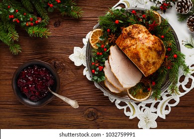 Christmas Baked Ham, Served On The Old Plate. Spruce Twigs All Around. Top View.