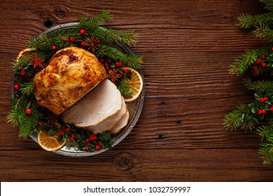 Christmas Baked Ham, Served On The Old Plate. Spruce Twigs All Around. Top View.