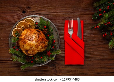 Christmas Baked Ham, Served On The Old Plate. Spruce Twigs All Around. Top View.