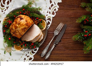 Christmas Baked Ham, Served On The Old Plate. Spruce Twigs All Around. Top View.