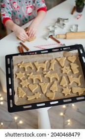 Christmas Baking Background: Dough, Cookie Cutters, Spices And Christmas Decorations. Christmas Cookies On A Black Baking Tray