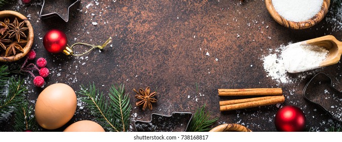 Christmas Baking Background. Ingredients For Cooking Christmas Baking On Dark Stone Background. Long Banner Format.