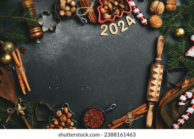 Christmas baking. New Year's card with the numbers "2024" and ingredients for baking. Free space for text. Top view. - Powered by Shutterstock