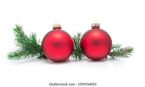 Christmas ball and green spruce branch, on white background