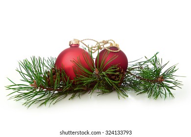 Christmas ball and green spruce branch