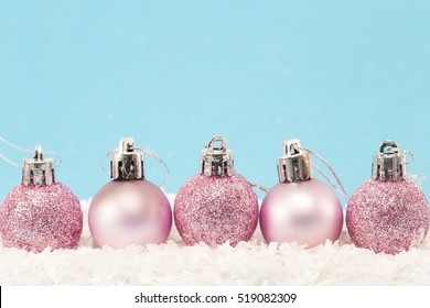 Christmas balls on white and blue background