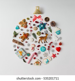 Christmas bauble made of decoration elements. Flat lay.
