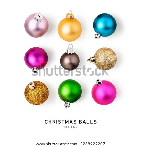 Christmas baubles, colorful balls pattern and creative layout isolated on white background. Design element. Holiday decoration. Flat lay, top view
