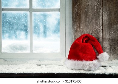 Christmas Baubles On Snow And Old  Window 