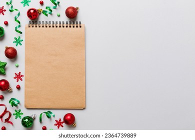 Christmas blank greeting card mock-up scene. Creative layout made of Christmas toy and paper card note. Flat lay. Nature New Year concept. - Shutterstock ID 2364739889