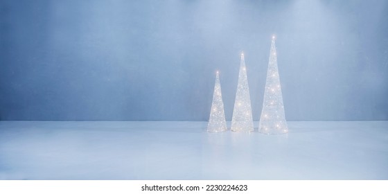 Christmas blue background with decor minimalism geometric  Christmas  trees with garlands and lights. Christmas mockup.  copy space - Powered by Shutterstock