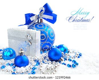 Christmas Blue And Silver Decorations On Snow