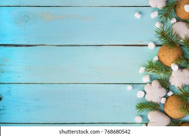 Christmas border with gingerbread, marshmallow and branch of fir tree. - Shutterstock ID 768680542