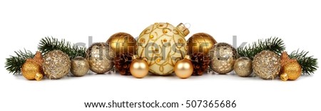 Christmas border of gold ornaments and branches isolated on a white background