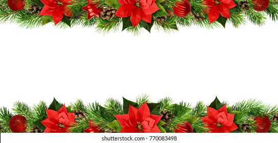 Christmas borders with red pionsettia flowers, pine twigs and decorations isolated on white. Flat lay. Top view.