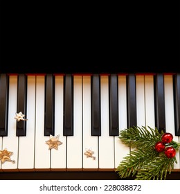 Christmas Branch On Piano Keys