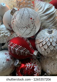 Christmas Bulbs In Old Wooden Bowl. Red And White Holiday Decorations. Old Fashioned Glass Bulbs Xmas Decor.