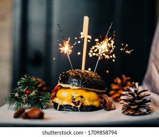 Christmas Burger With Black Bread And Sparklers